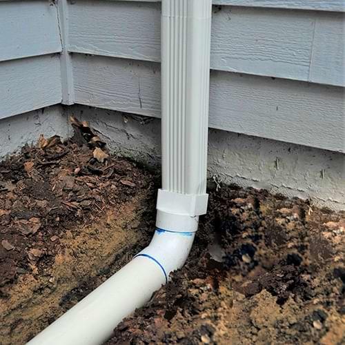 Klaus Larsen Roofing of Hudson Valley installs gutter downspout extensions in Carmel, White Plains, Newburgh